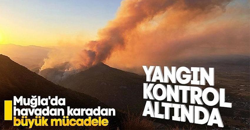 Muğla'nın Ula ilçesinde çıkan orman yangınına havadan müdahale başladı